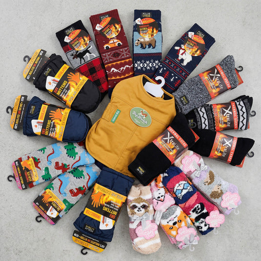 Assorted pairs of socks with various designs on a gray surface